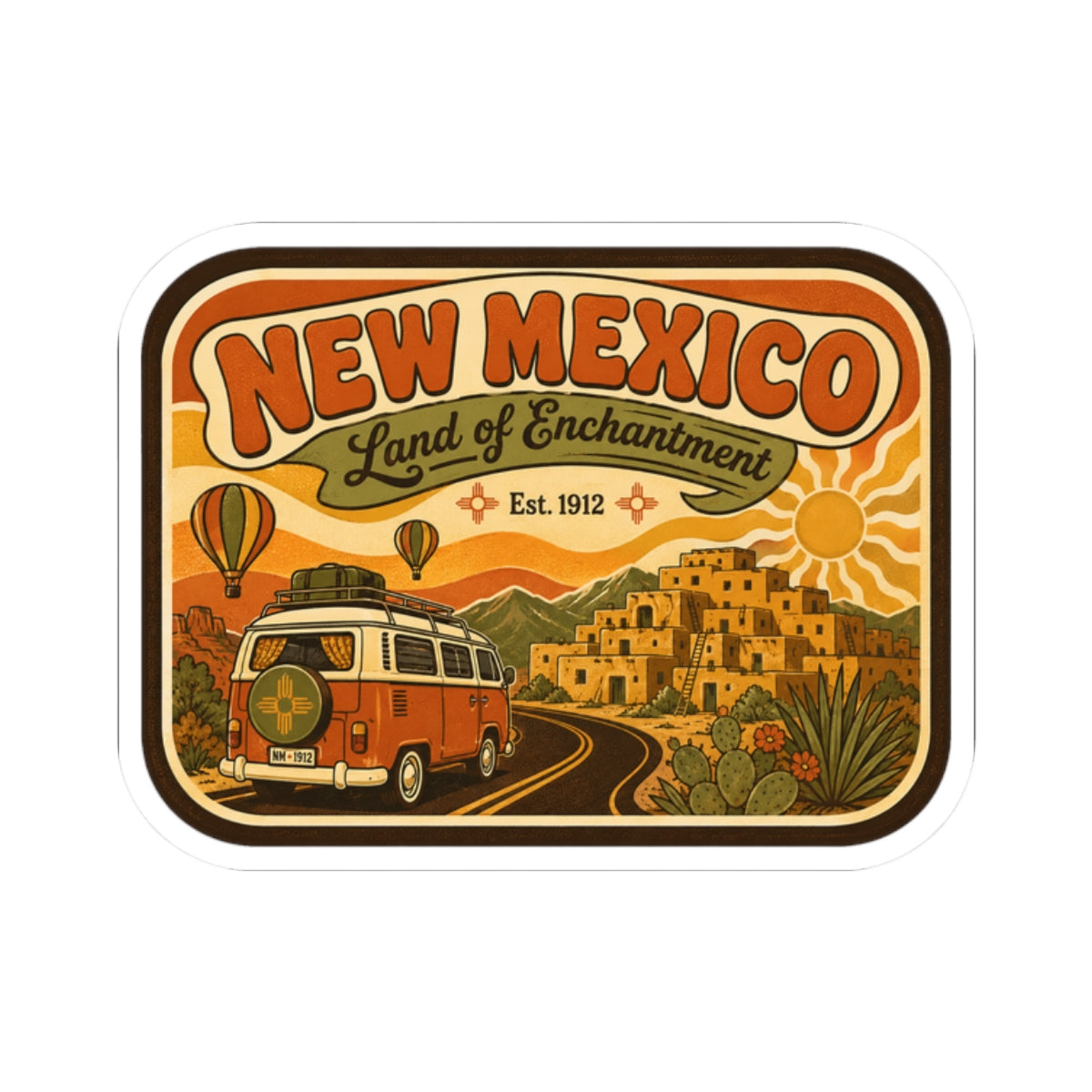 Die-cut New Mexico sticker showing vintage camper on winding road with desert town and cacti