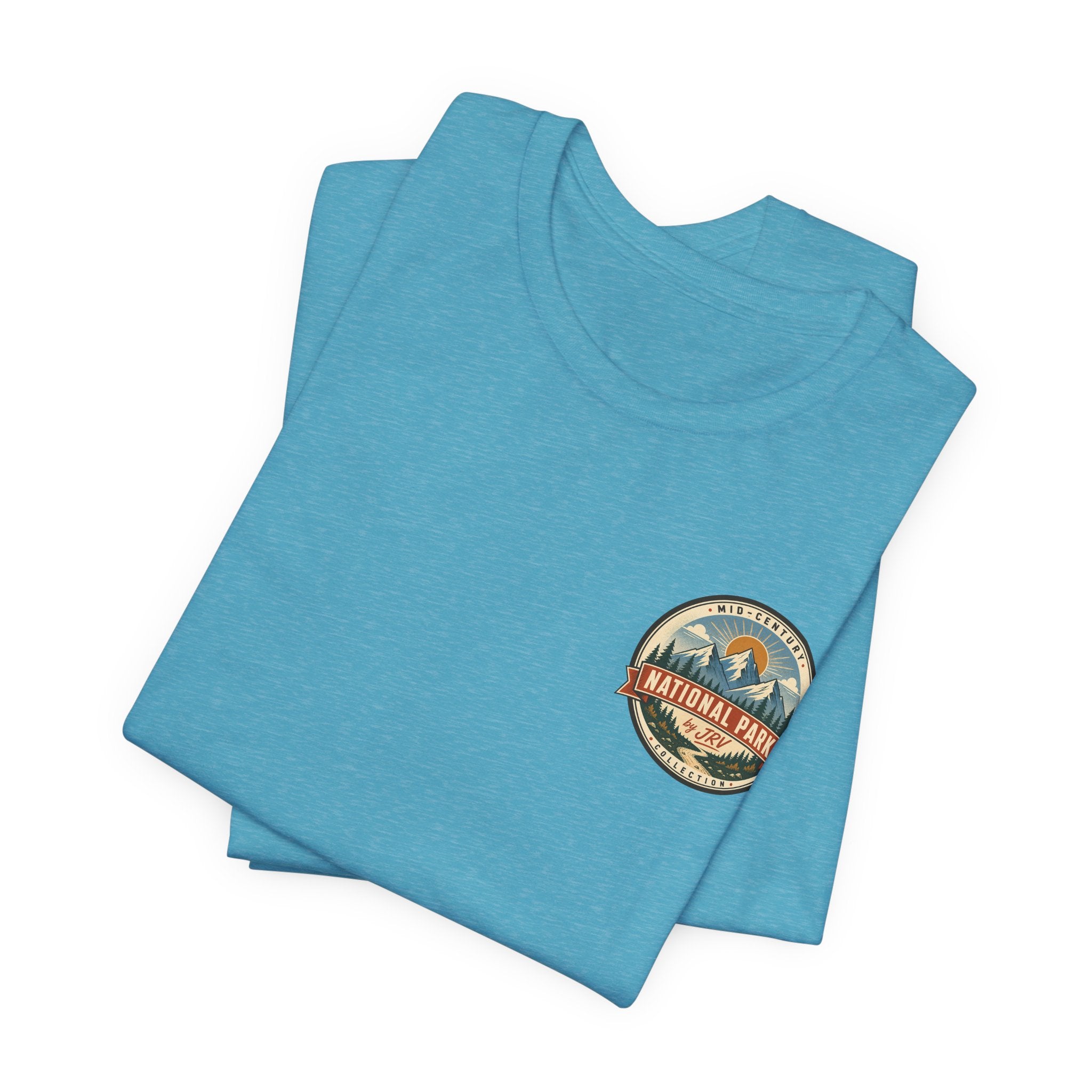 Heather aqua t-shirt, folded, with round National Park patch logo on chest.