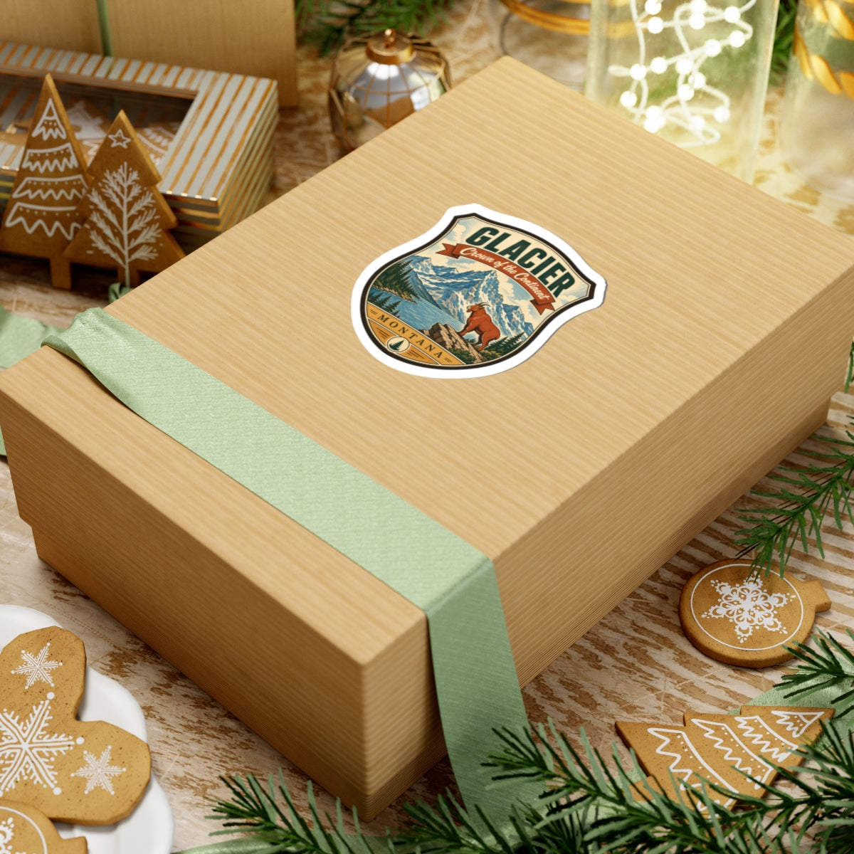 Sticker on a box: shield design with “GLACIER,” mountains, pine trees, brown dog, “MONTANA”