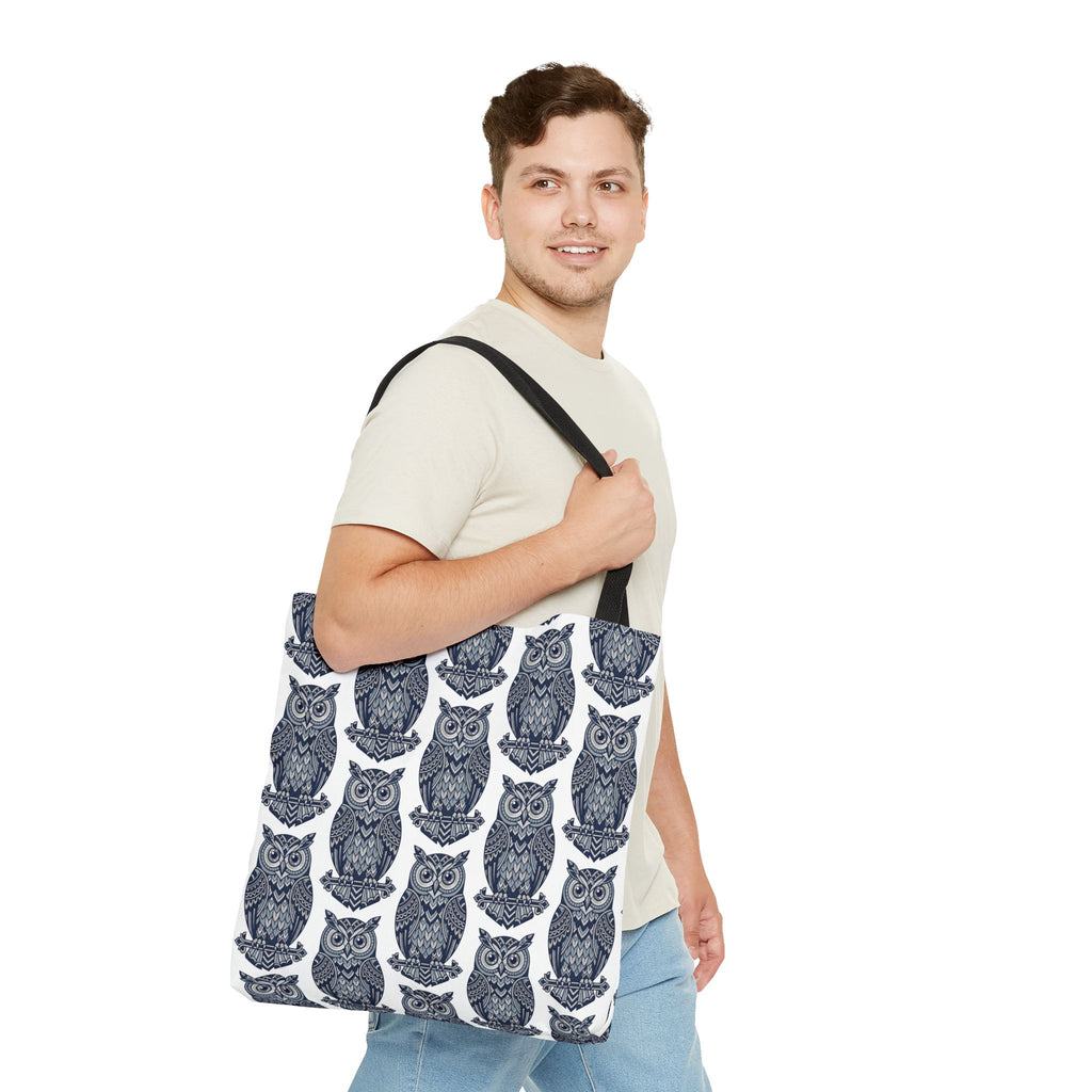 Owl pattern tote bag with black handles, worn on shoulder; blue and white owl repeat.