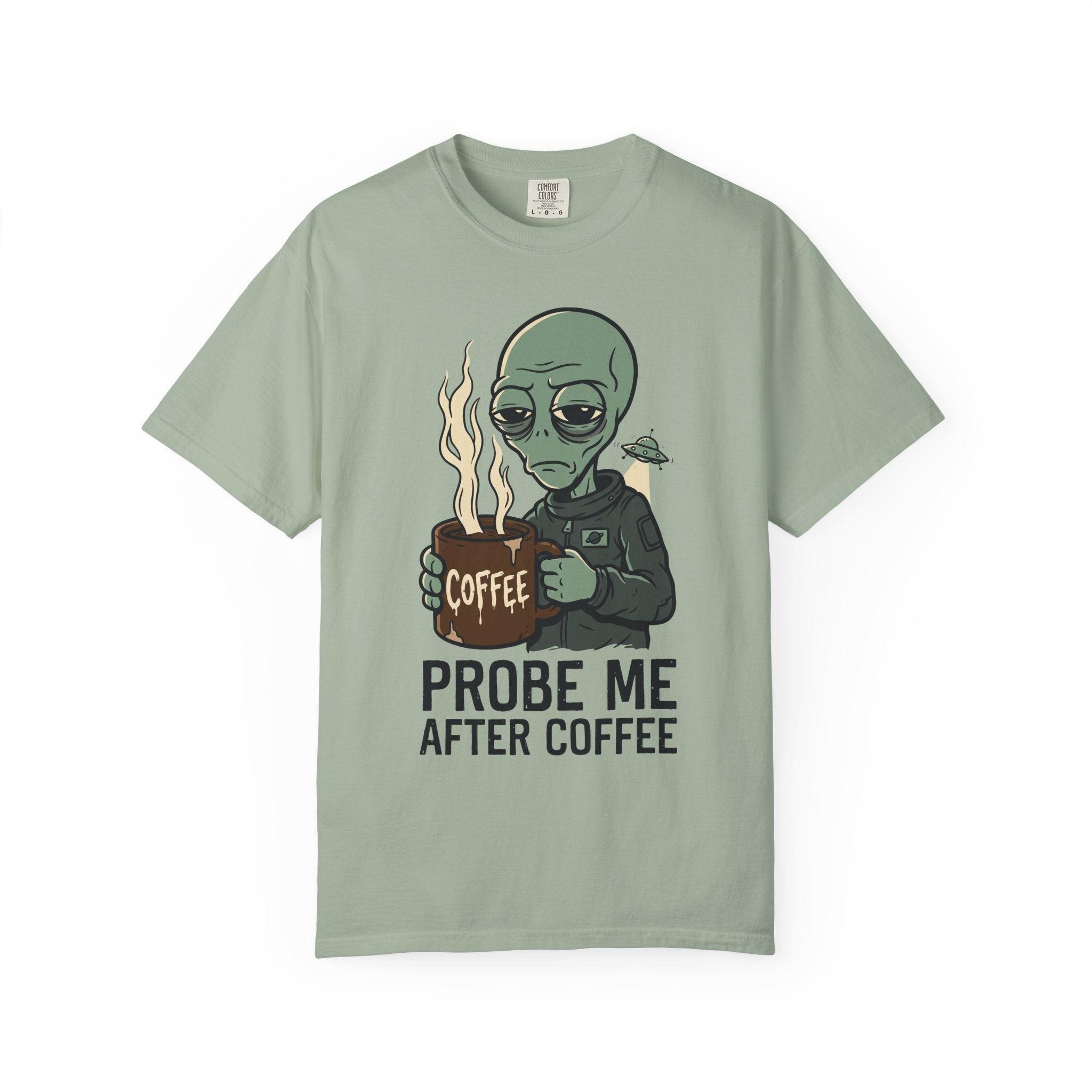 Sage green T-shirt with alien holding coffee and flames, "PROBE ME AFTER COFFEE" print