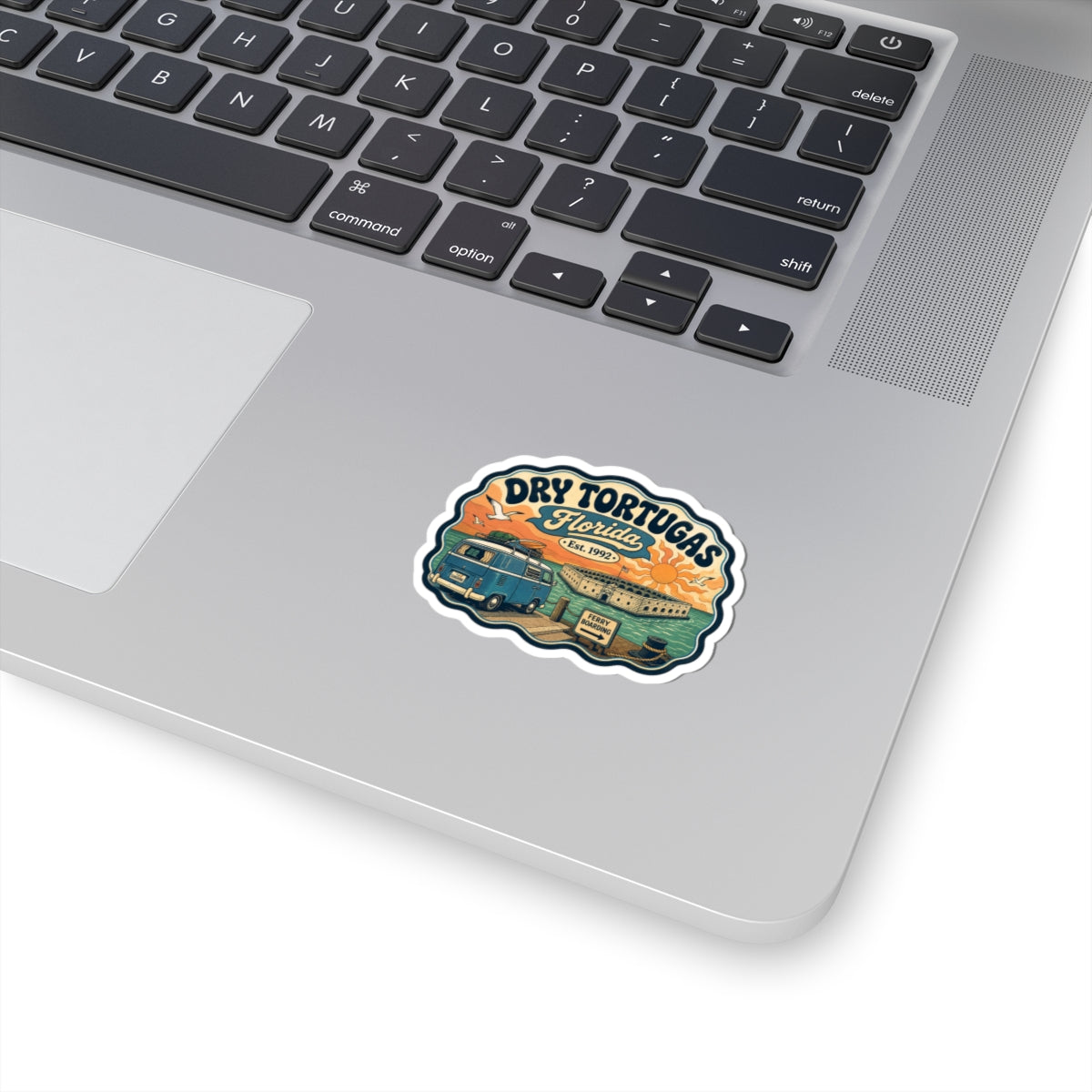 Dry Tortugas badge sticker with vintage boat illustration.