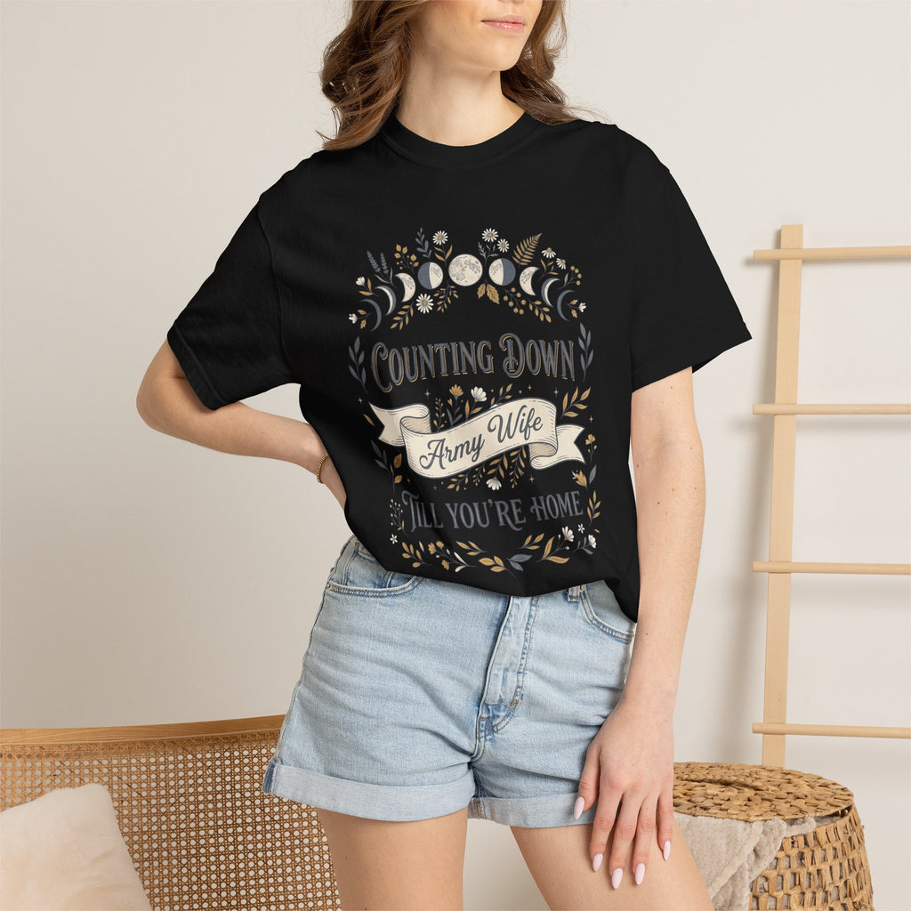 Black T-shirt with 'Counting Down' crescent floral graphic, worn by model.