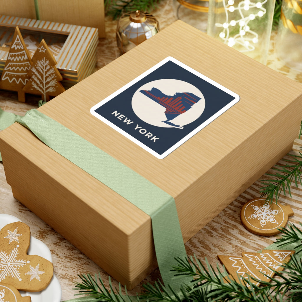 New York skyline sticker on wrapped gift: blue map with red skyline and “NEW YORK” text