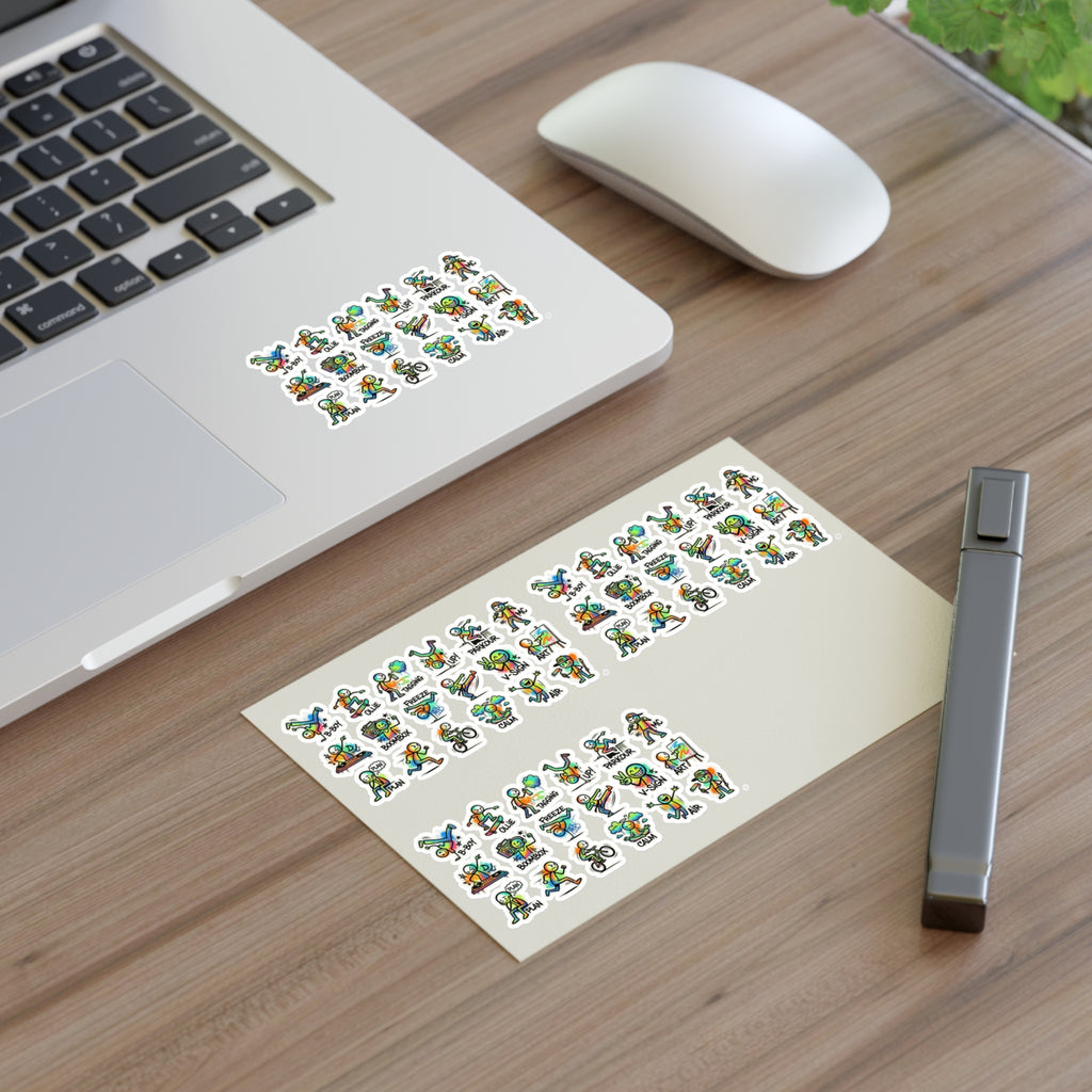 Stickerbogen in Mini-Form auf Schreibtisch: viele kleine Charakter-Icons