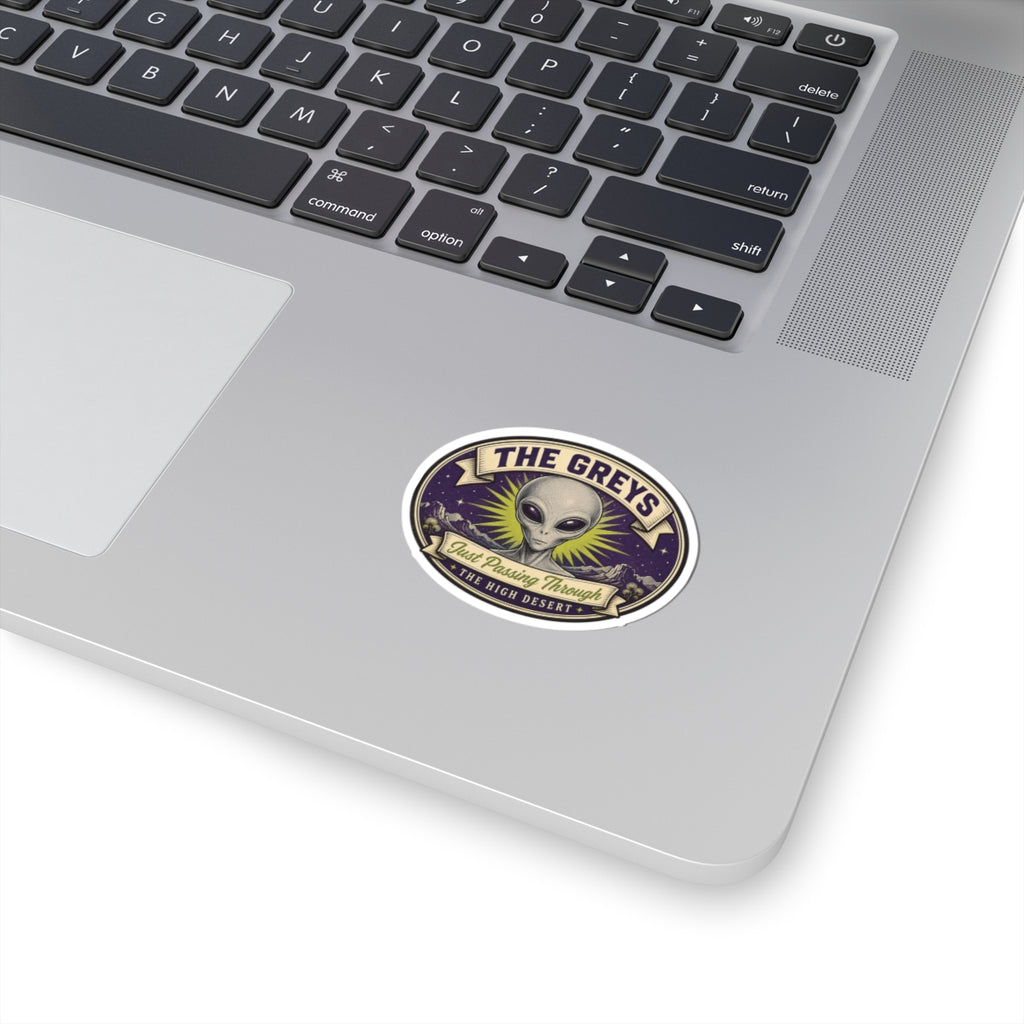 Circular kiss-cut sticker with alien head emblem and dark outer ring