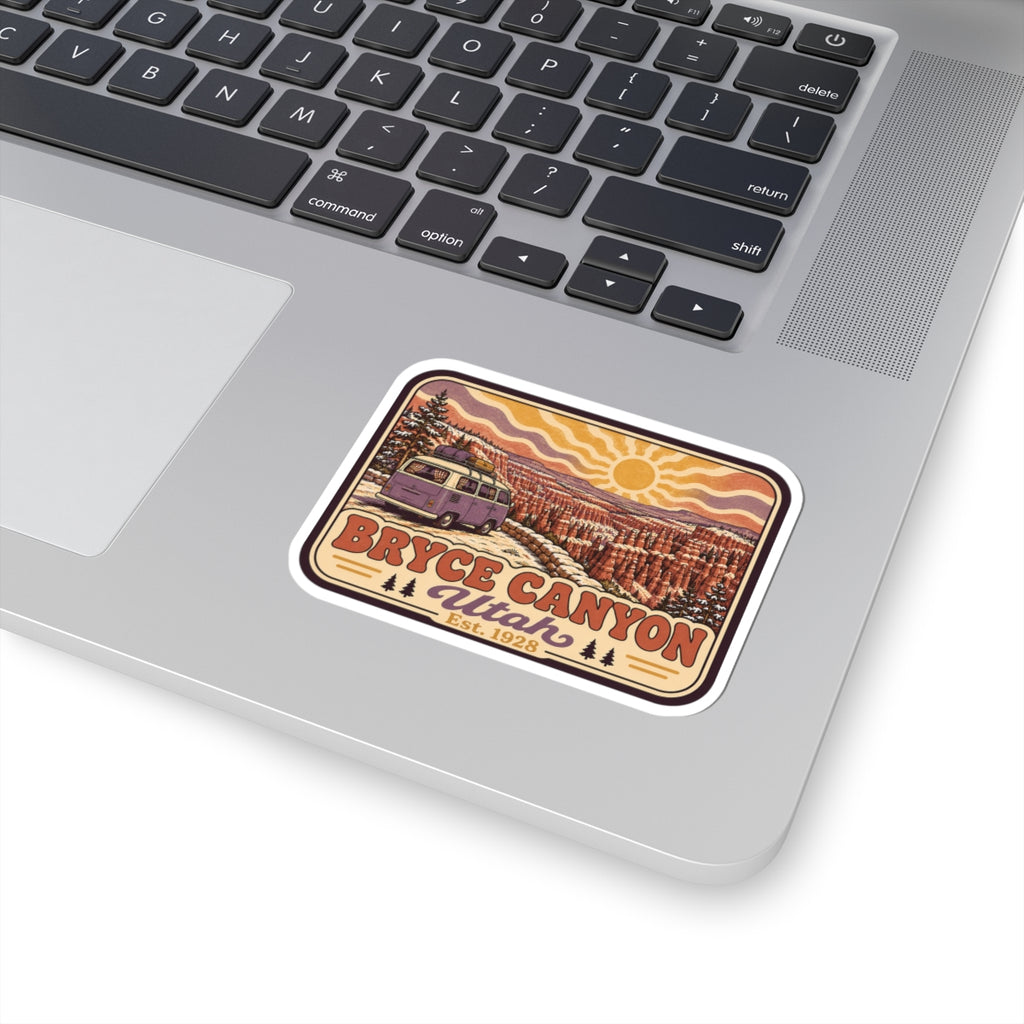 Kiss-cut Bryce Canyon Utah sticker on laptop showing retro camper van and canyon scene
