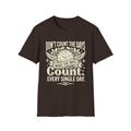 Dark chocolate T-shirt with clock graphic and quote: “Don’t count the days, make the days count.”