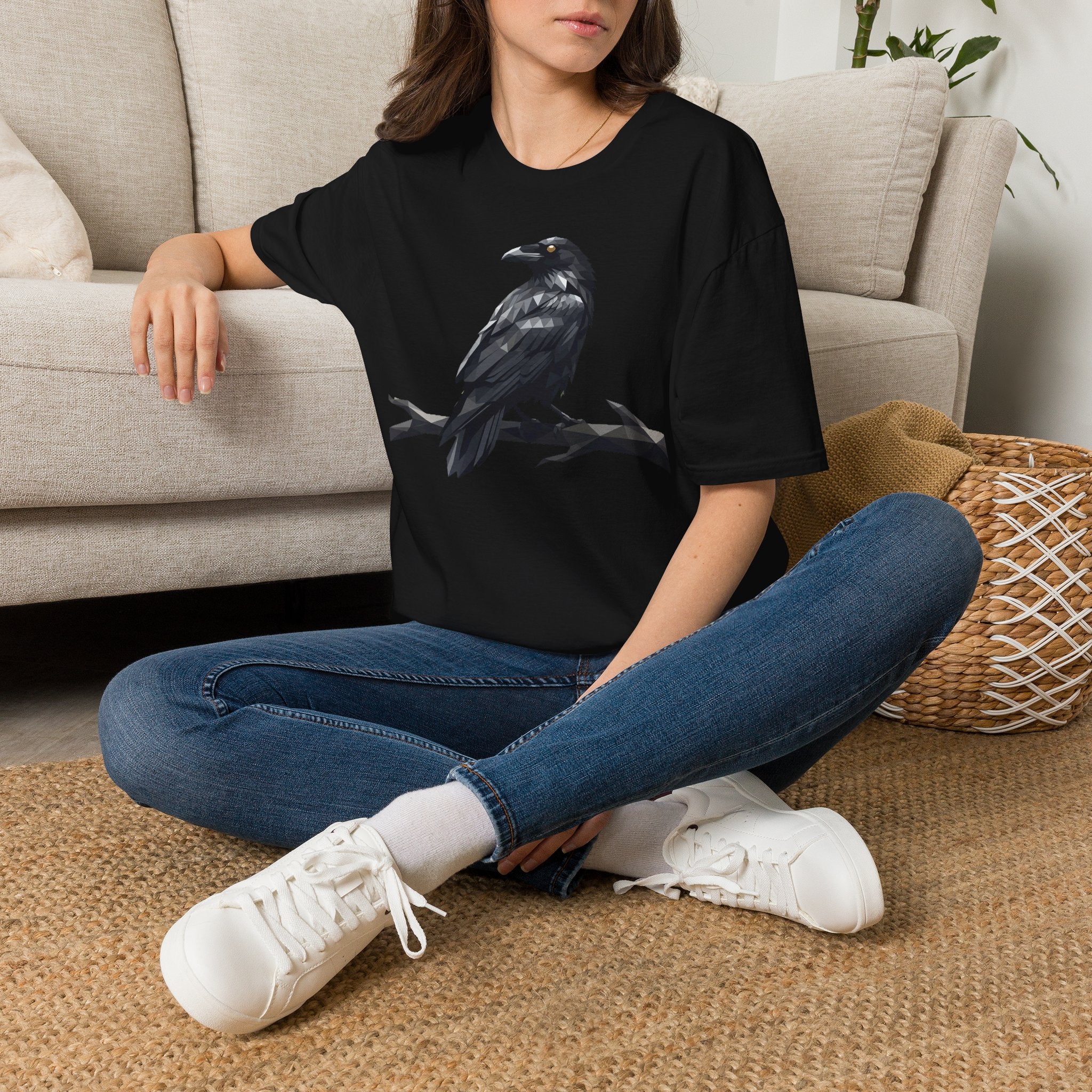 Black raven bird graphic T-shirt on model, short sleeves, front design