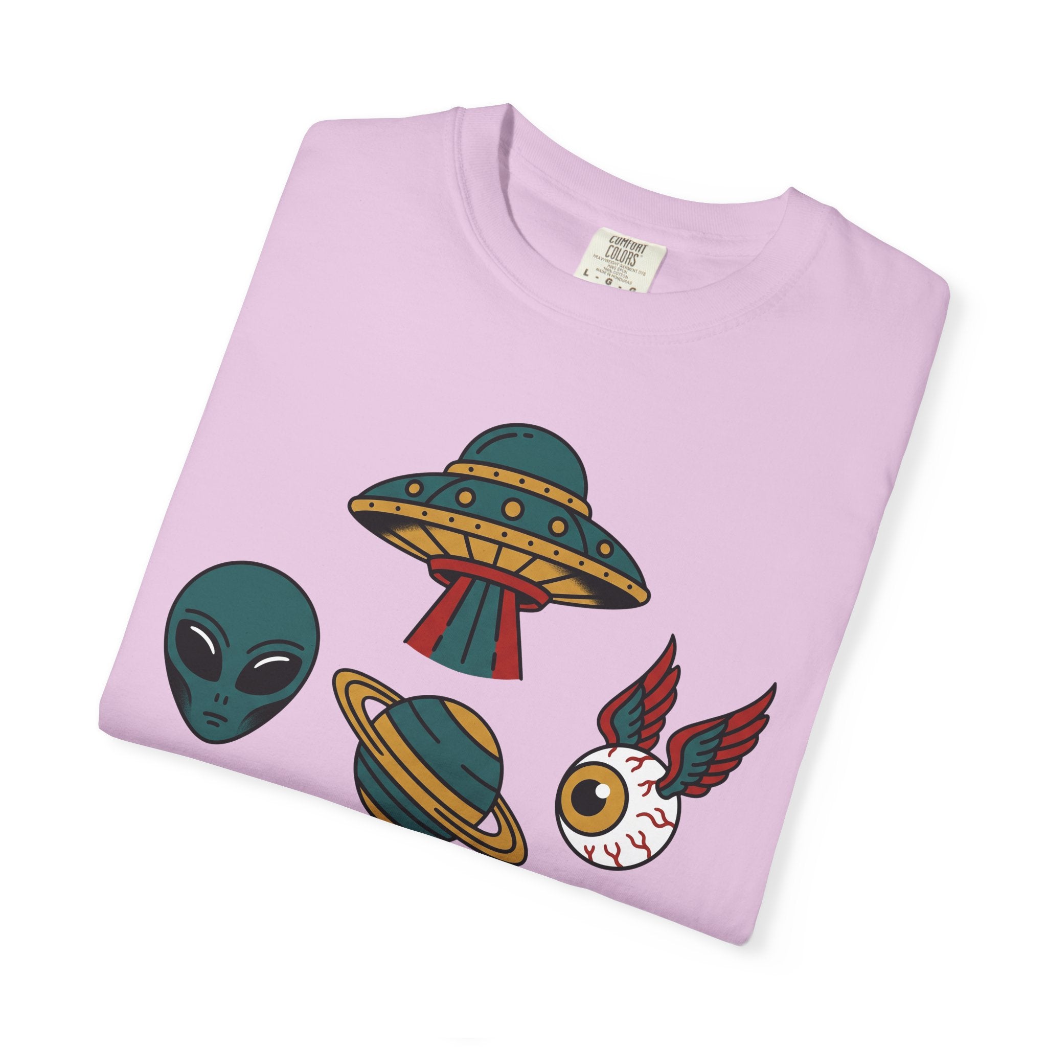 Lavender T-shirt close-up: UFO, alien, and cat graphic