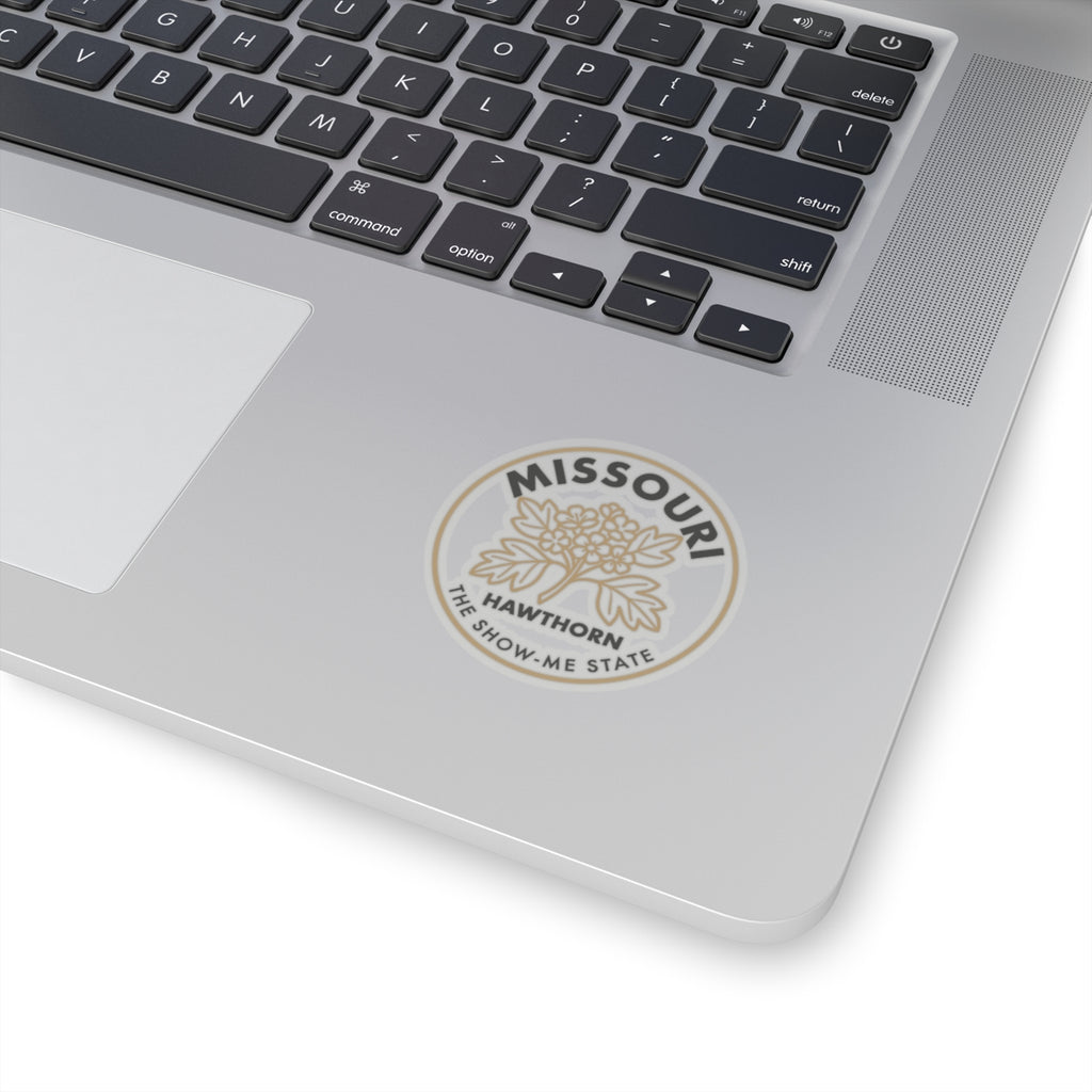 Transparent vinyl hawthorn state sticker on laptop lid, round seal with Missouri text
