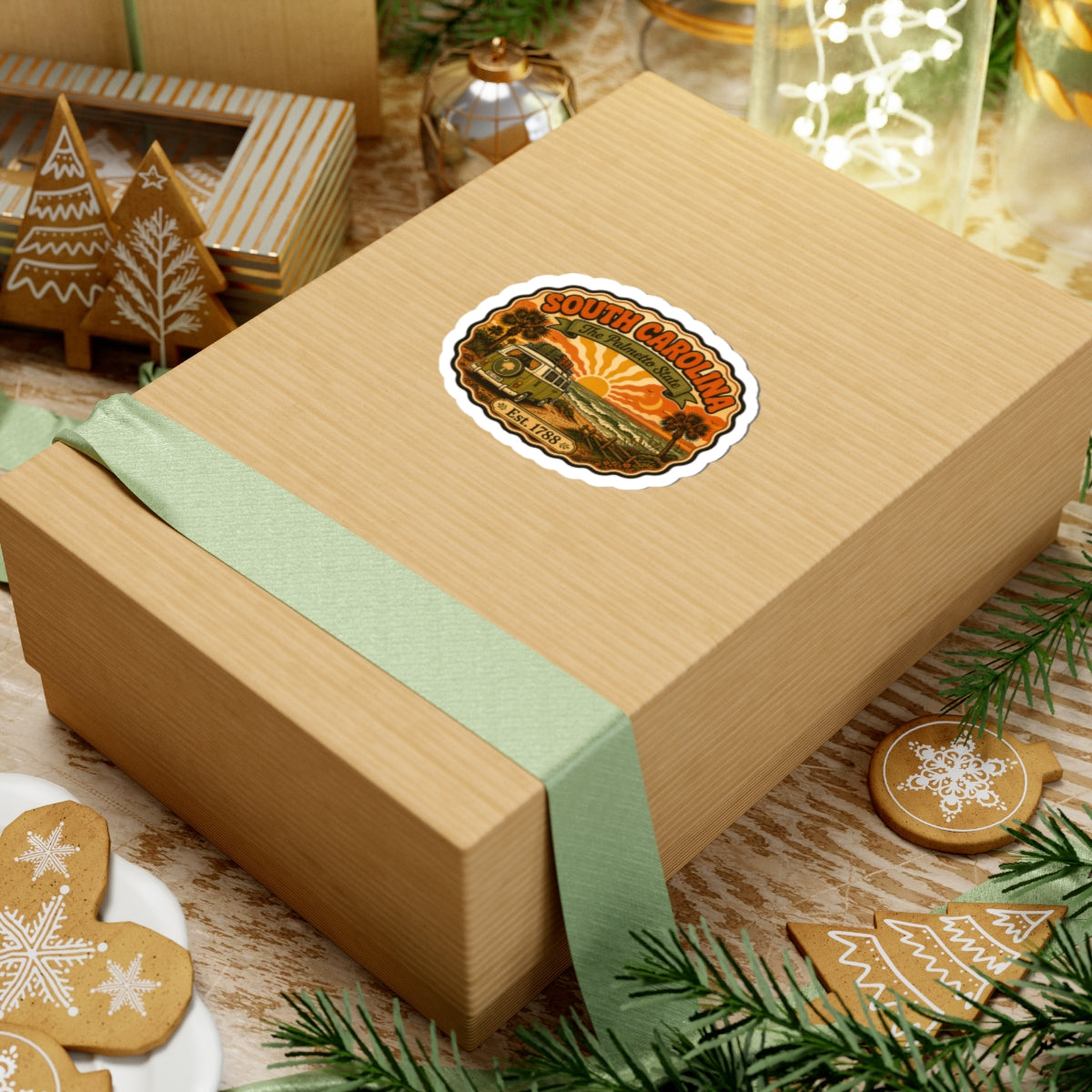South Carolina sticker on a wrapped gift box; camper, palms, sunset, The Palmetto State.