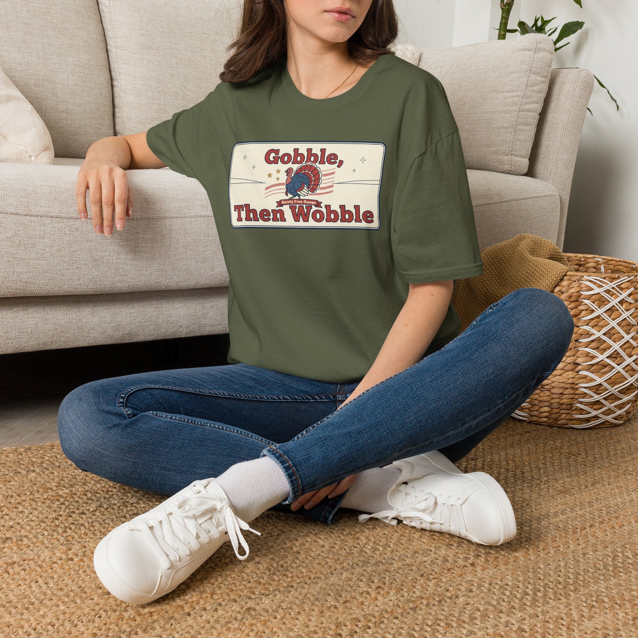 Military green T-shirt with “Gobble Then Wobble” turkey graphic on the chest.