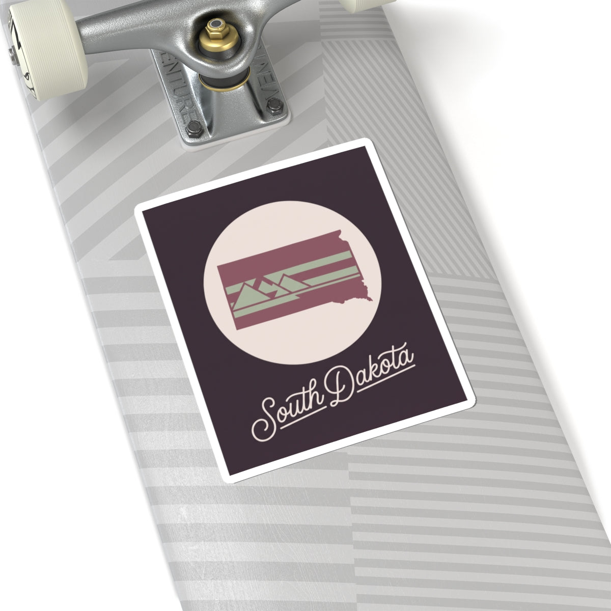 South Dakota kiss-cut decal on a planner, dark purple rectangle with state silhouette graphic