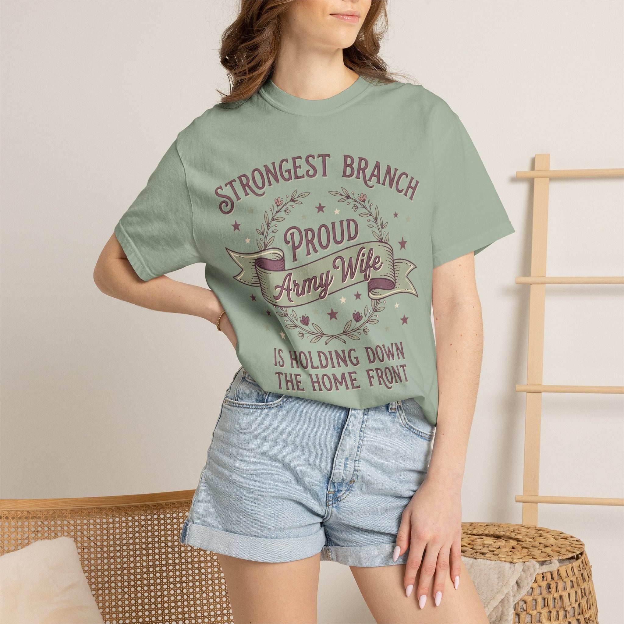 Mint green T-shirt worn by model with Strongest Branch and Proud Army Wife front print.
