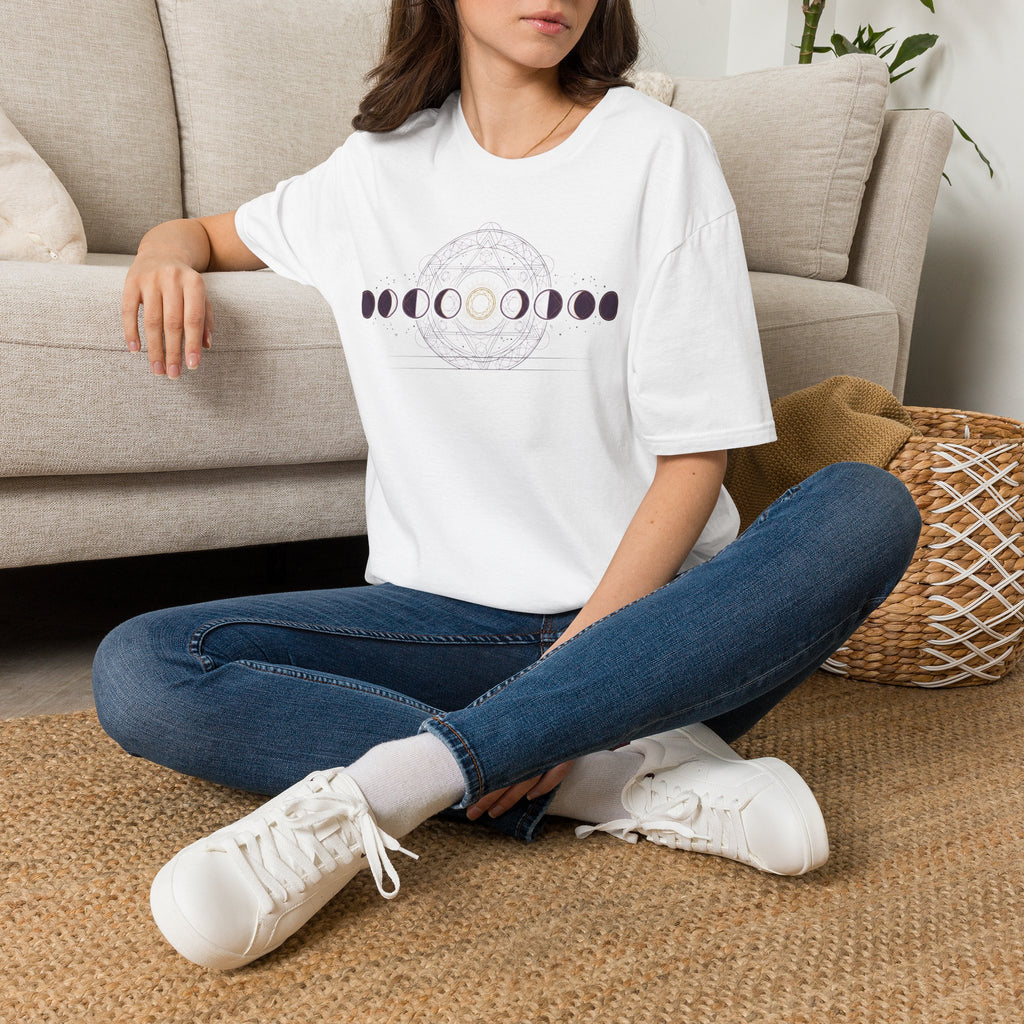 White moon phases graphic t-shirt with circular dotted design across the chest