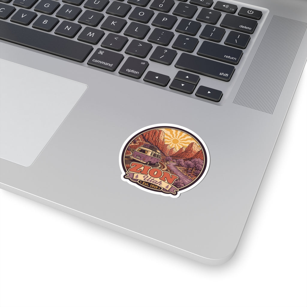 Circular Zion National Park sticker with orange sun and camper van, kiss-cut