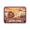 Rounded rectangle sticker with vintage camper, desert landscape, "White Sands" and banner