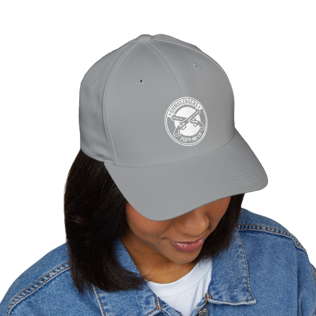 Light grey embroidered baseball cap with circular white emblem on front