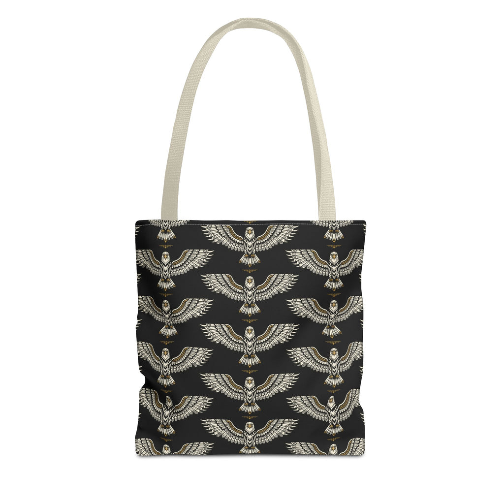Tote bag with winged scarab pattern, black background, gold emblems, cream handles