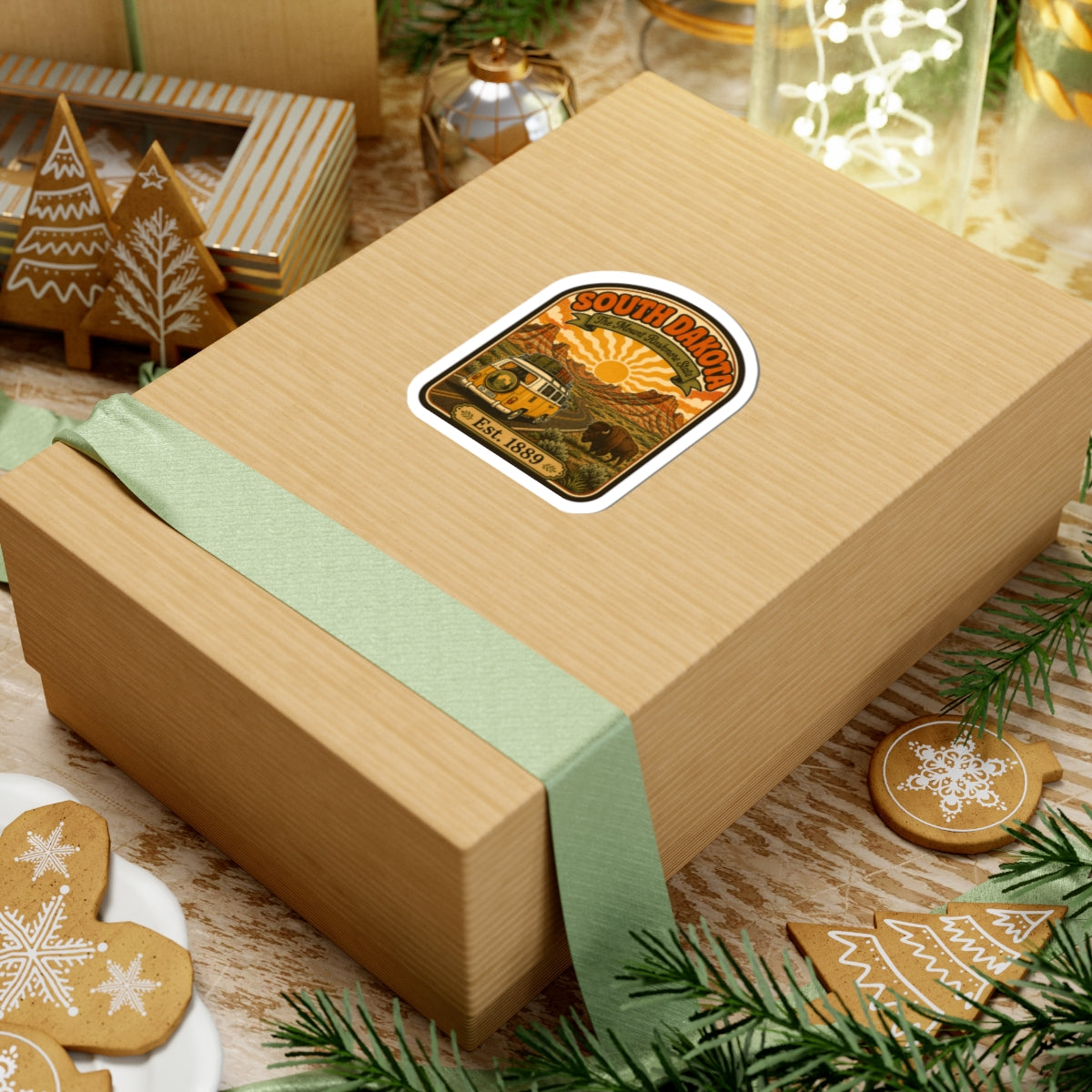 Die-cut South Dakota sticker featuring retro landscape art, buffalo, and Est. 1889 date.