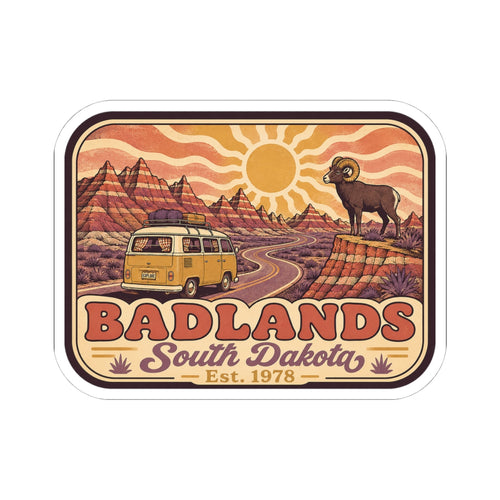 Kiss-cut sticker showing Badlands South Dakota graphic with camper van, bighorn sheep, sun