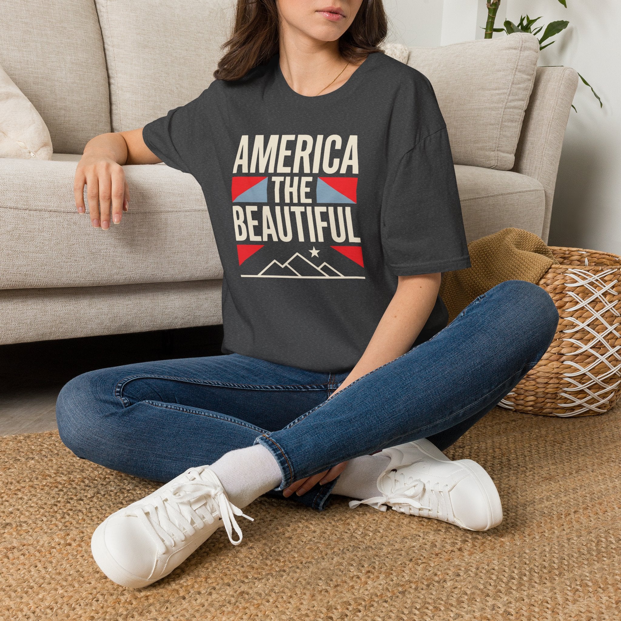 Navy short-sleeve T-shirt with “AMERICA THE BEAUTIFUL” graphic and flag design.