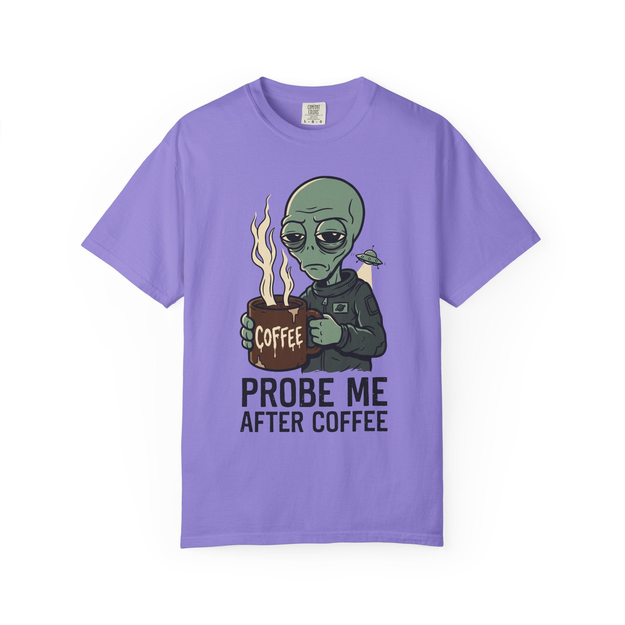 Lavender T-shirt with green alien holding a coffee mug and “PROBE ME AFTER COFFEE” print
