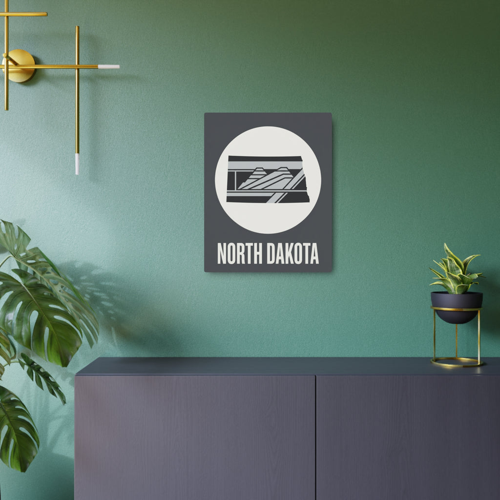 Square metal wall sign with dark finish, circular landscape graphic, and “NORTH DAKOTA” text