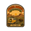 Die-cut South Dakota travel decal with buffalo scene, mountains, and Est. 1889 at bottom.