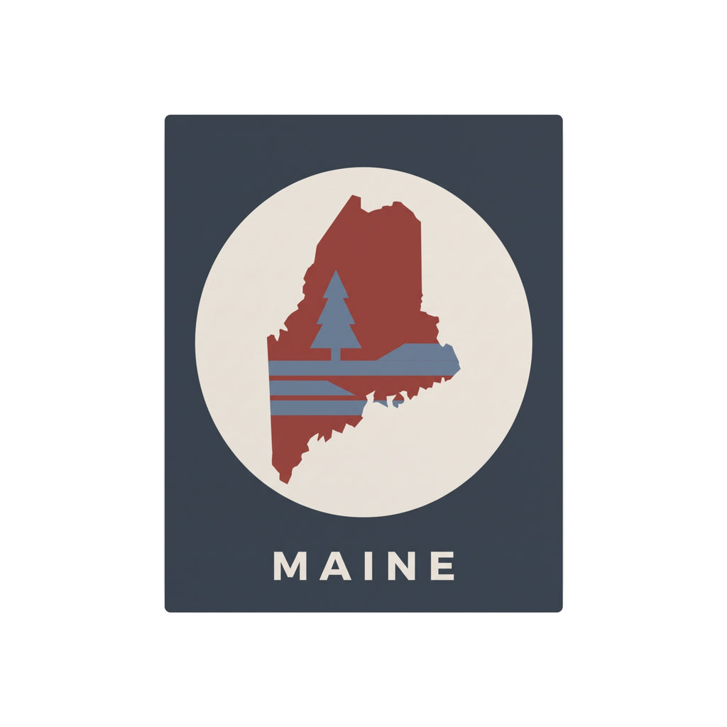 Maine state silhouette metal art sign with circular pine tree graphic and “MAINE” text