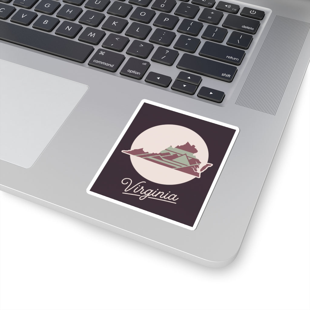 Virginia decal on a laptop keyboard: state graphic and “Virginia” script