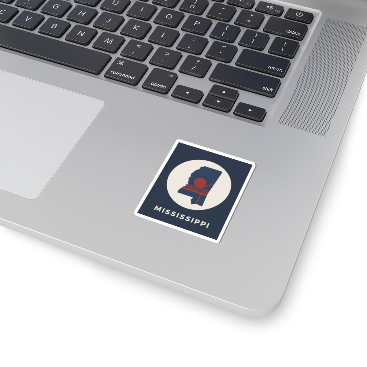 Kiss-cut sticker with Mississippi silhouette and retro sun graphic emblem