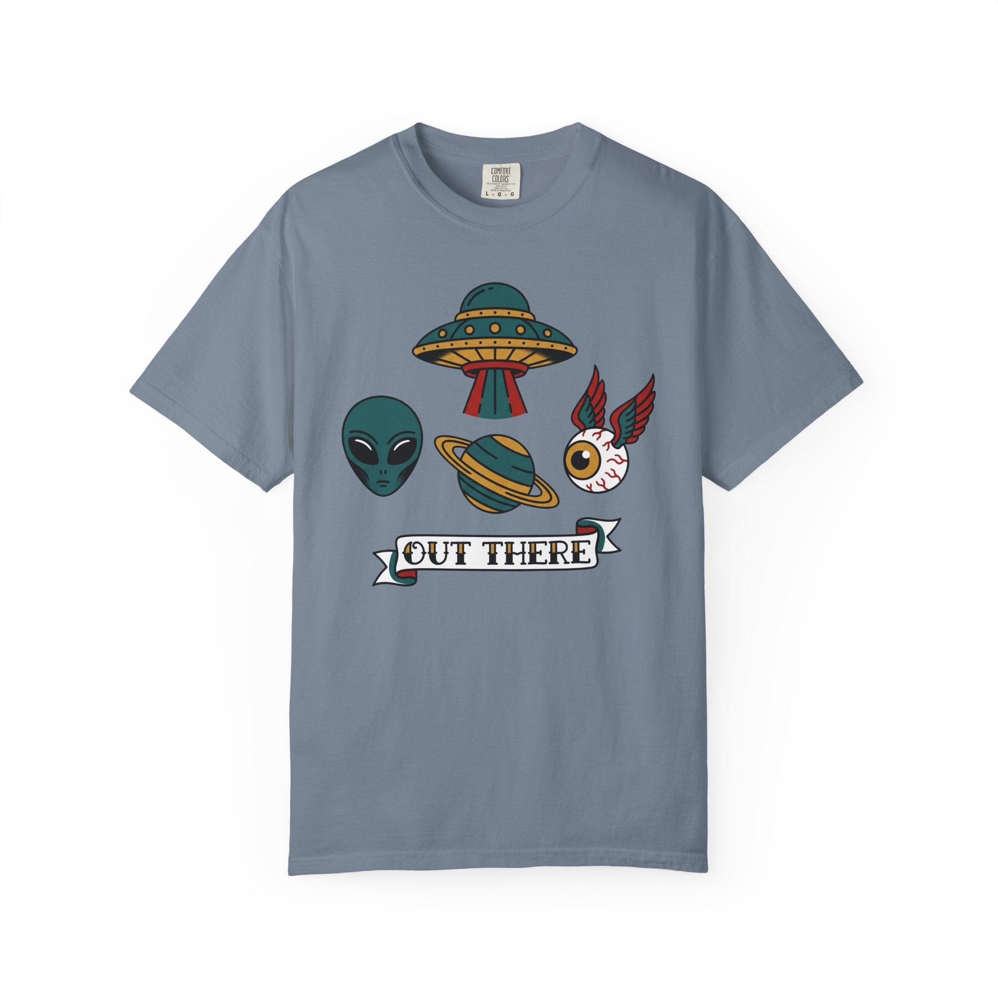 Slate blue graphic T-shirt with alien, UFO, and "OUT THERE" patch-style print