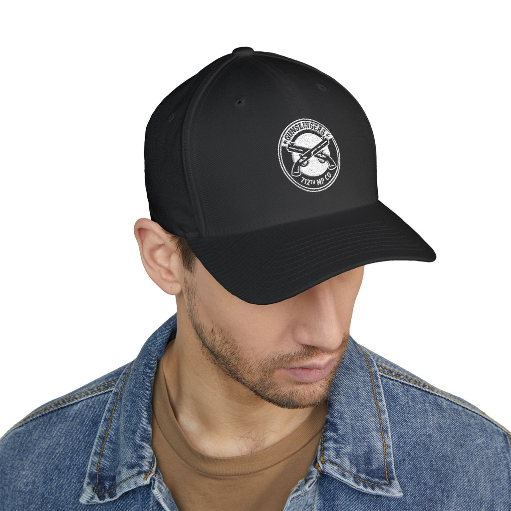Embroidered baseball cap, dark gray, with circular white emblem badge
