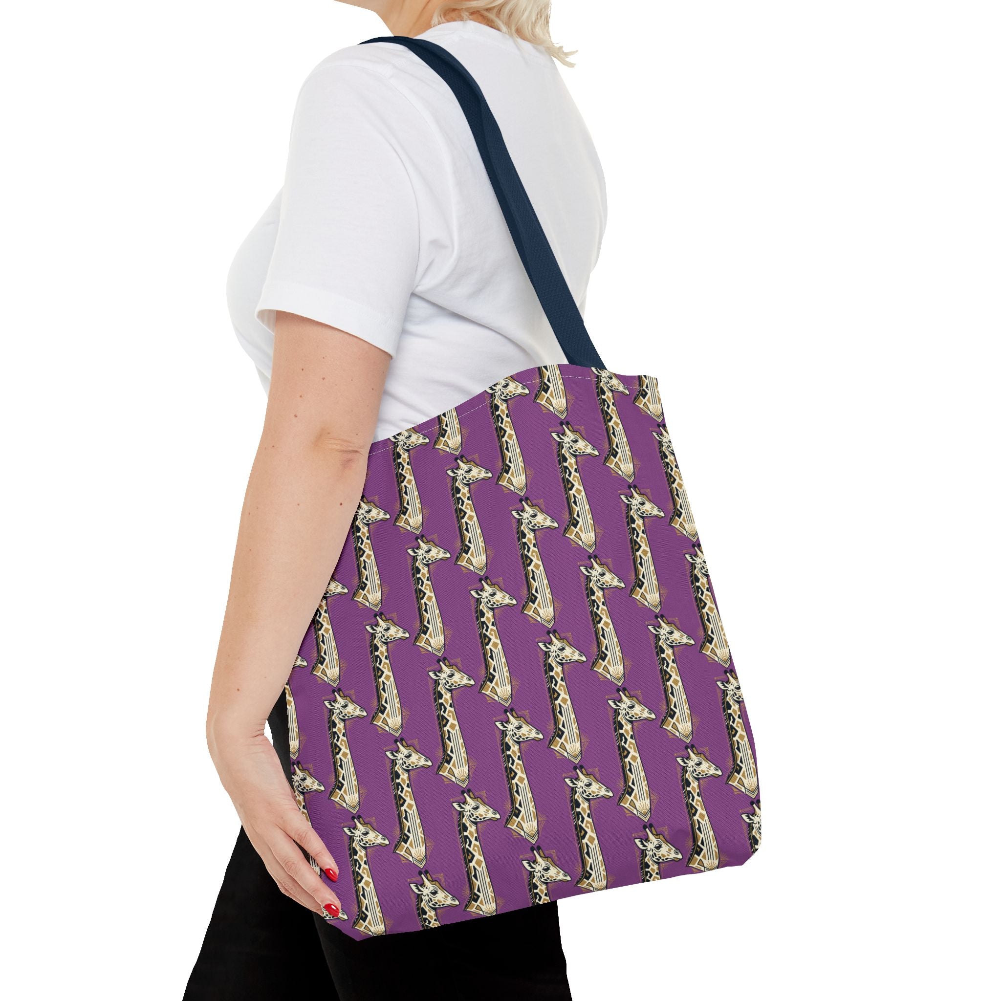 Purple tote bag with repeating saxophone pattern and navy handles, worn on shoulder.