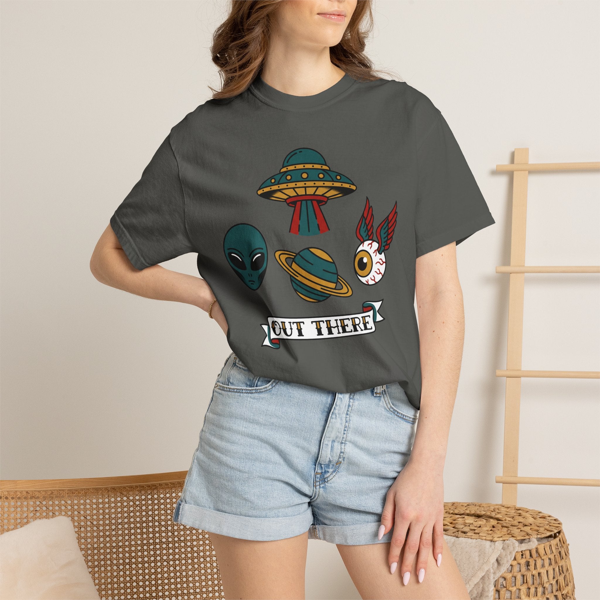 Grey alien and UFO patchwork graphic T-shirt with “OUT THERE” label on front