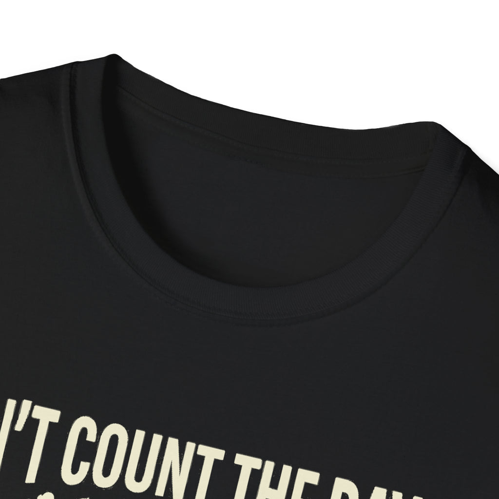 Black T-shirt crew neck close-up with partial “Don’t count” text print.