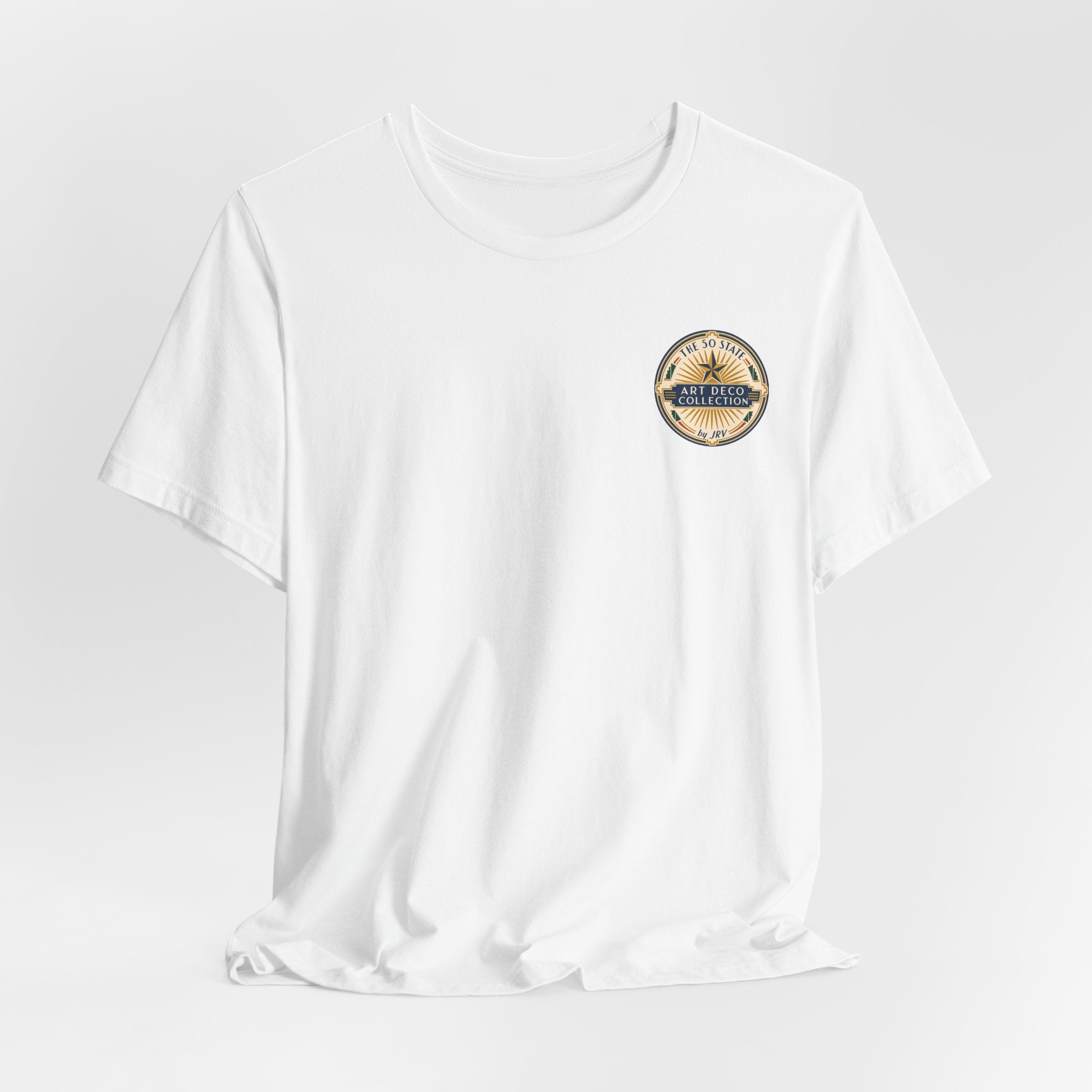 White T-shirt with small circular badge on left chest