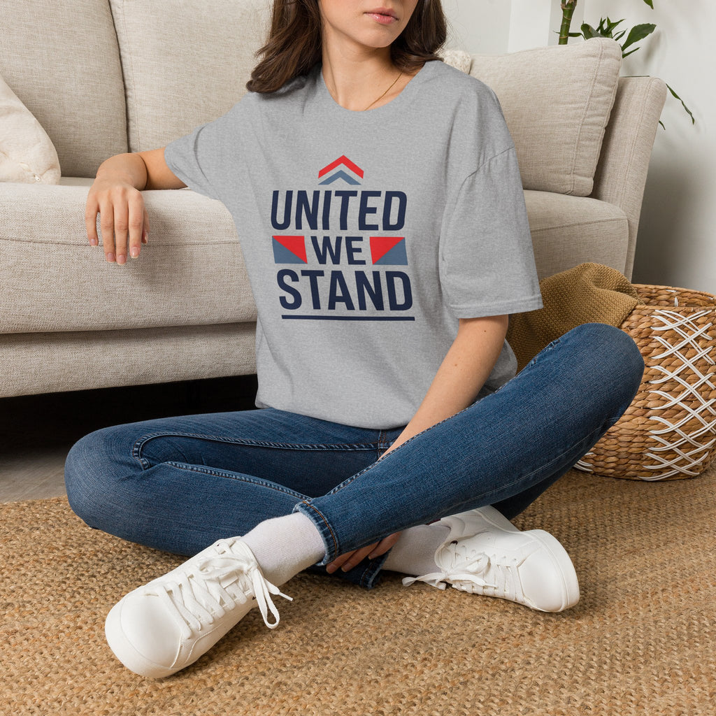 Gray T-shirt worn by model, 'United We Stand' patriotic graphic on front