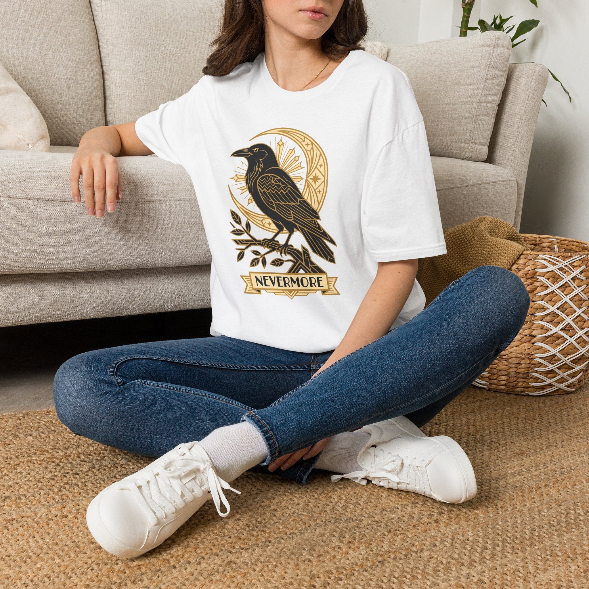 White crewneck T-shirt with gold raven and moon graphic on front