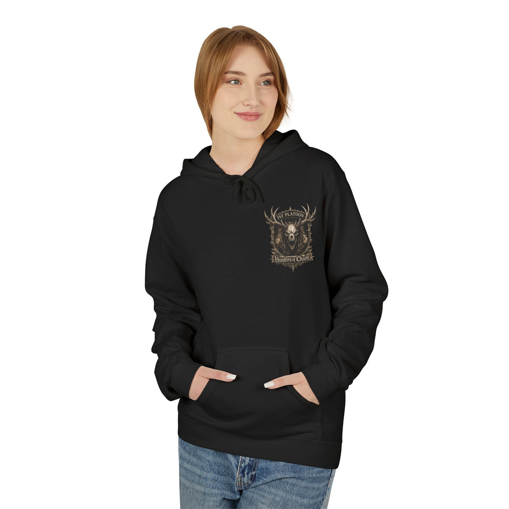 Black cotton hoodie worn by model, front deer emblem graphic and kangaroo pocket
