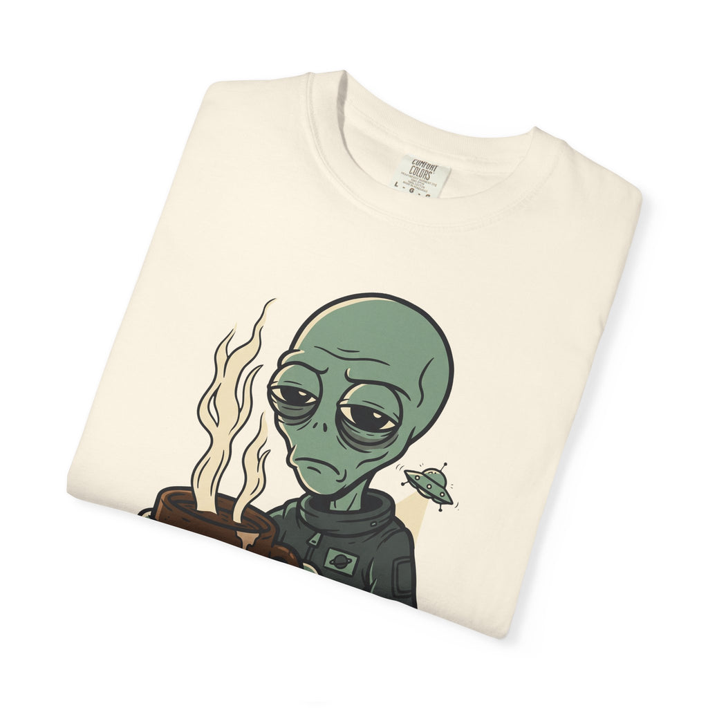 Ivory crew-neck T-shirt with alien holding coffee and small spaceship graphic.