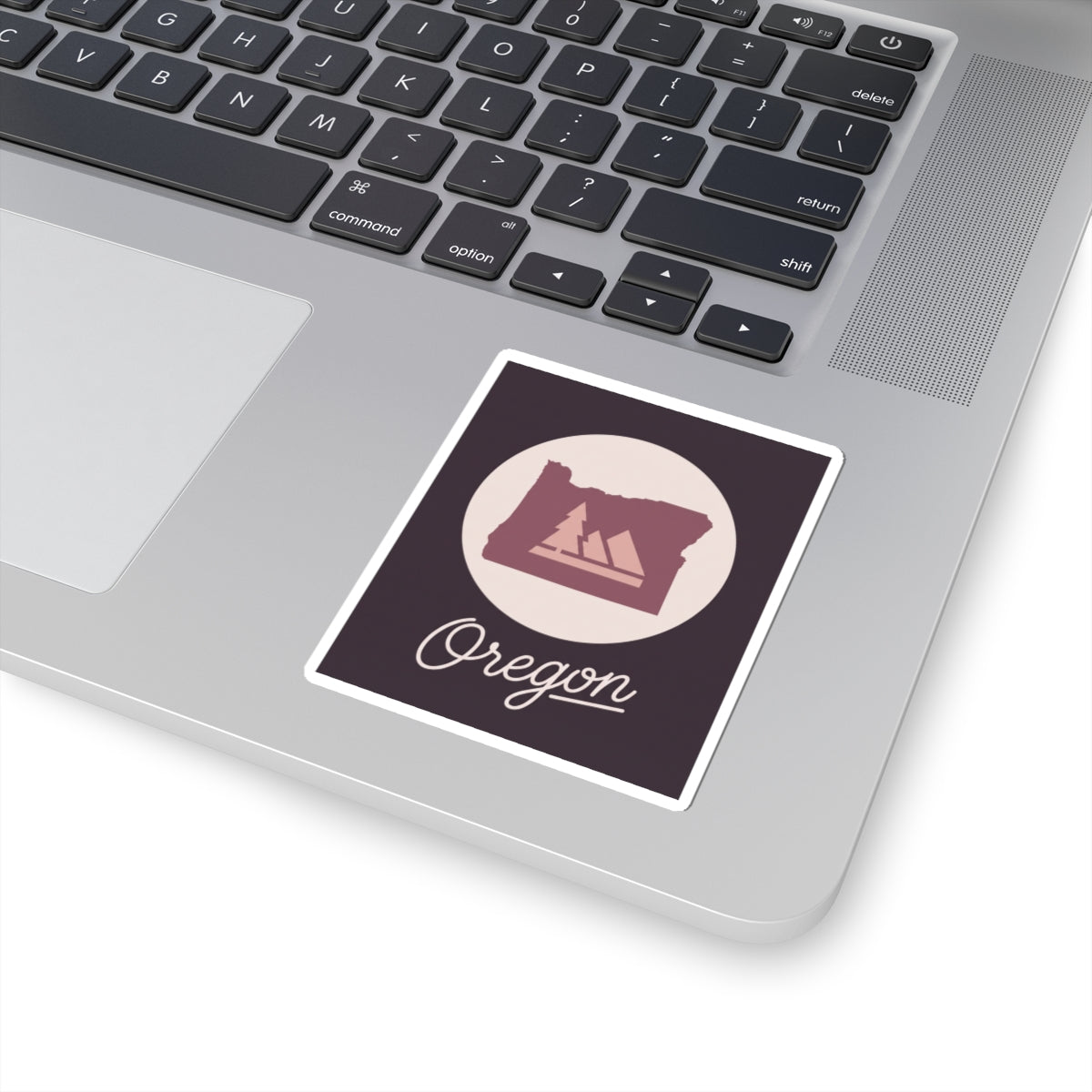 Square kiss-cut Oregon decal sticker with circular state emblem and cursive Oregon word