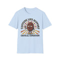 Light blue T-shirt with cartoon coffee bean and “CRITICAL CONDITION” graphic