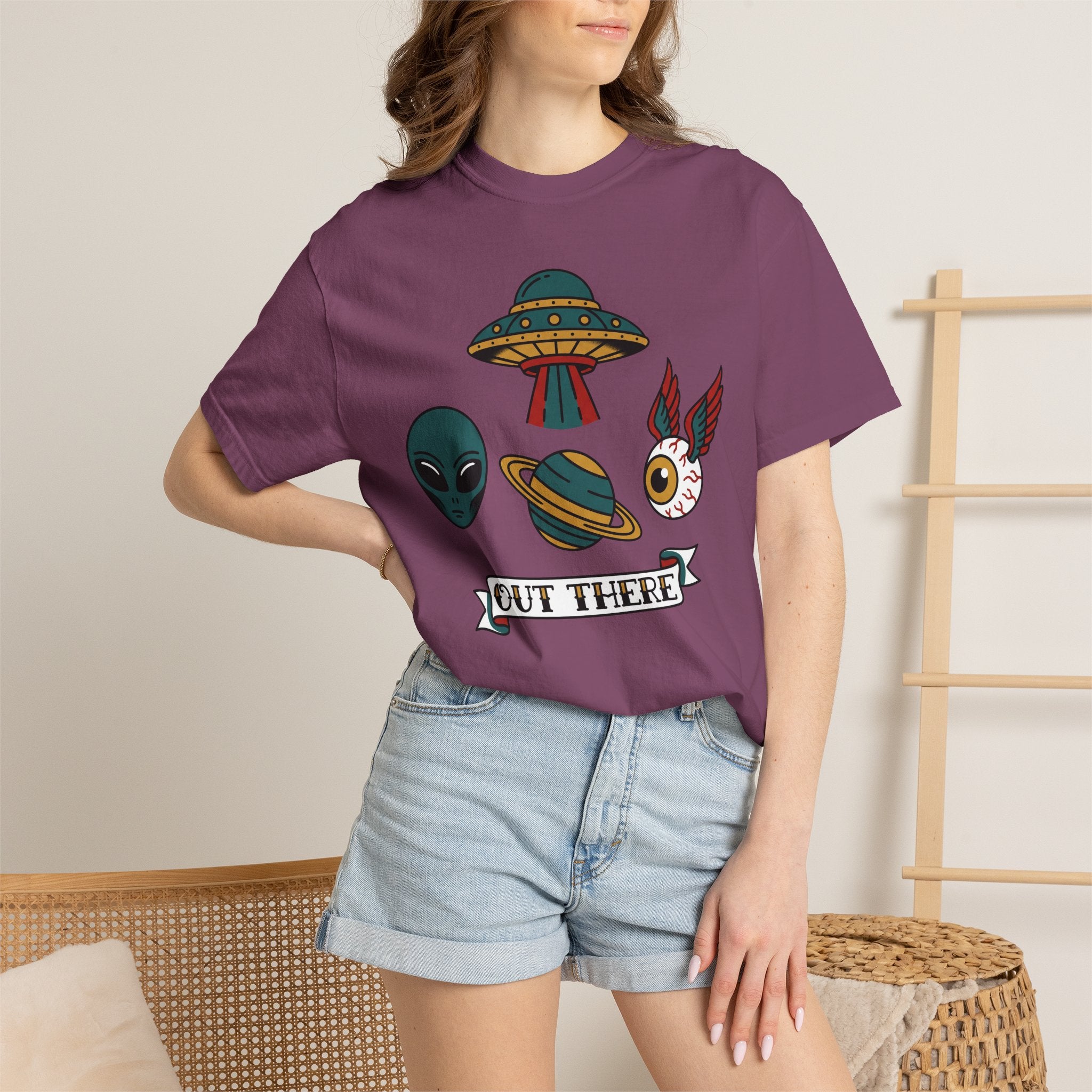 Dark purple T-shirt with alien face, UFO, cat graphic on the chest