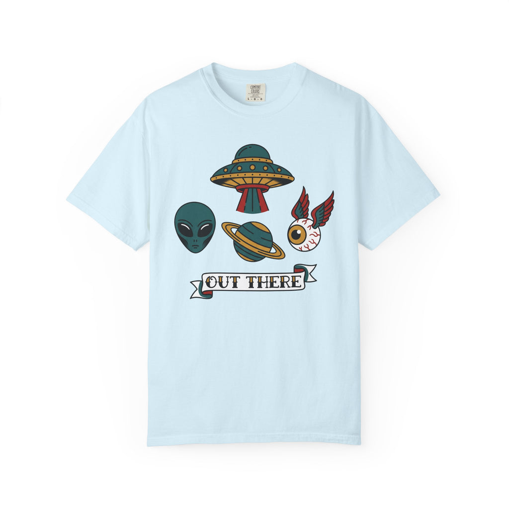 Light blue T-shirt with alien, UFO, and “OUT THERE” banner graphic at center
