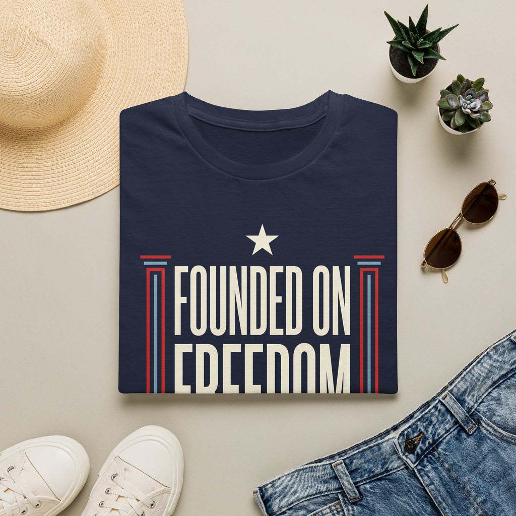 Navy short-sleeve t-shirt with white star and "Founded on Freedom" graphic