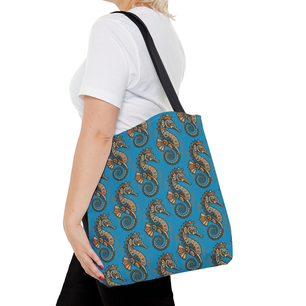 Tote bag with blue all-over seahorse pattern and black shoulder straps