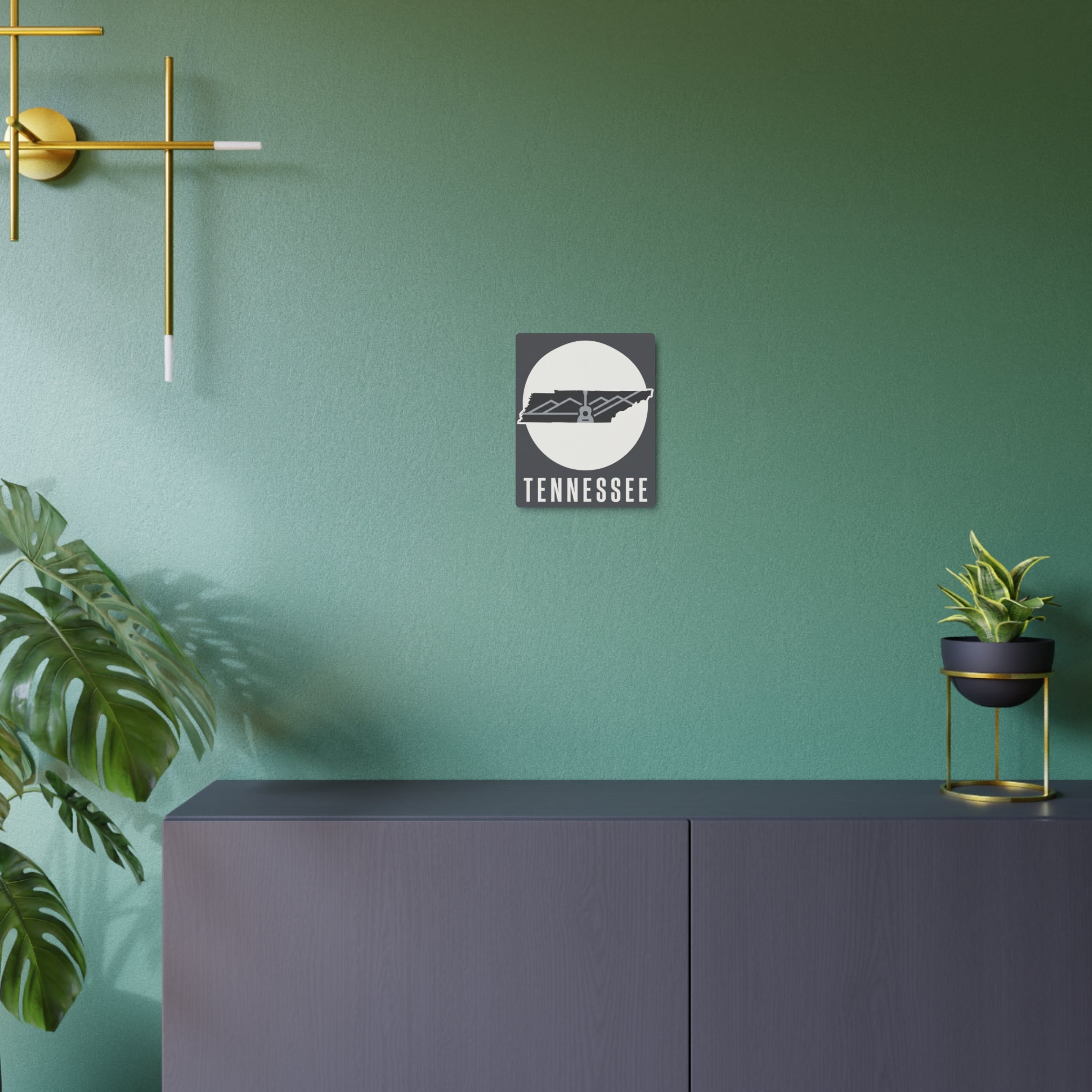 Tennessee metal wall art on green wall, dark square sign with circular guitar skyline